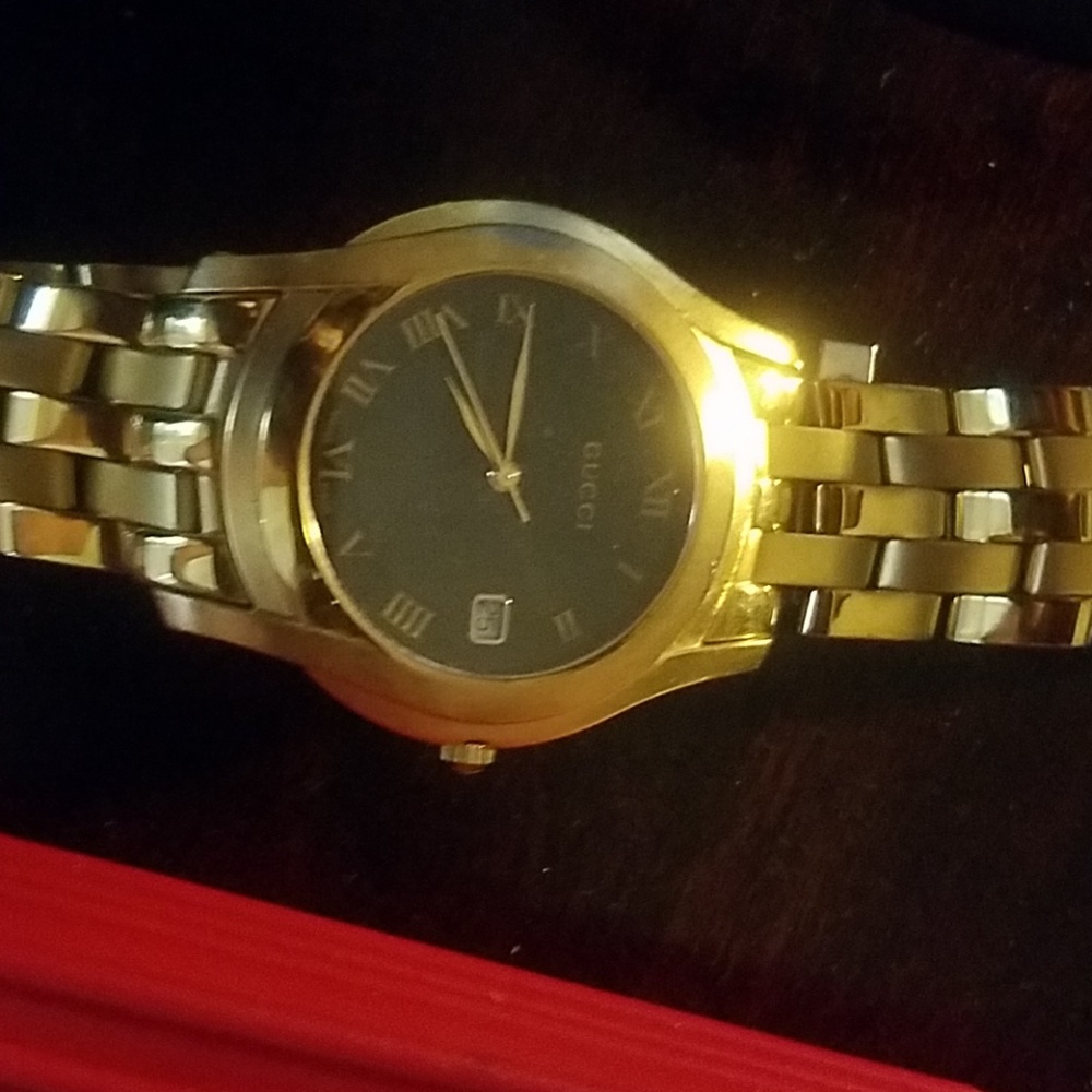 Men's gold-plated Gucci watch